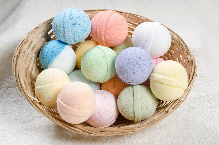 Colorful Epsom salt bath bombs in a woven basket for mess-free, relaxing spa baths