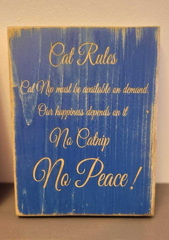 Cat Lovers Laser Engraved Wall Art with playful feline design and witty cat puns on blue background.