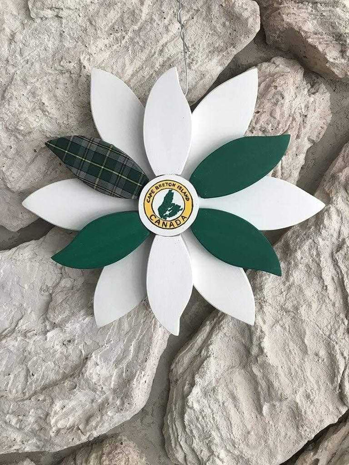 Handcrafted wooden flower decoration with Cape Breton Tartan design, suitable for indoor and outdoor use.