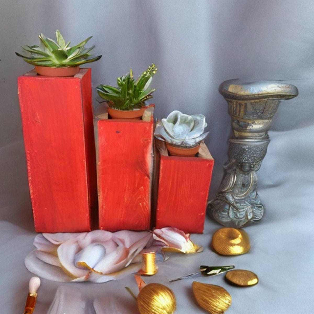 Wooden planter succulent holder set with three rustic red wooden planters and succulents.
