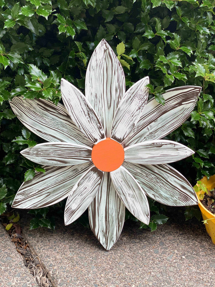 Handcrafted zebra-themed wooden flower with chocolate brown and white stripes for home decor.