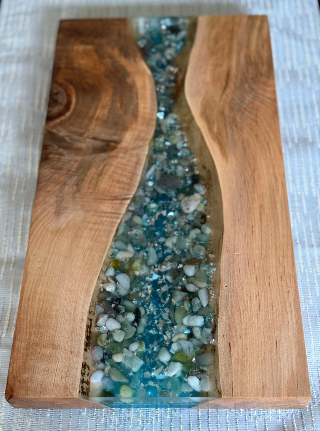 Maple epoxy resin serving tray with vibrant color infusion and stones, handcrafted in Canada.