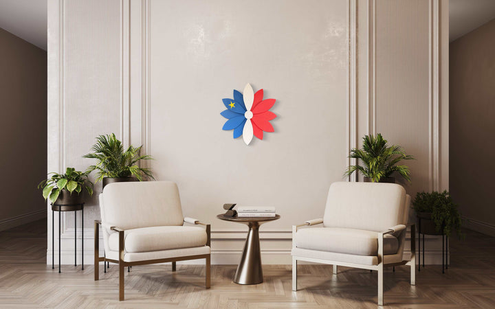 Acadian heritage flower design wall art, 24-inch, solid pine, hand-painted, featuring Acadian flag colors in a modern living room.