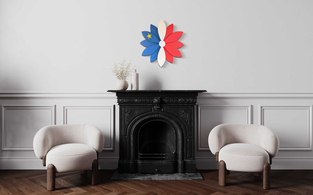 Acadian heritage flower design wall art above fireplace in elegant living room.