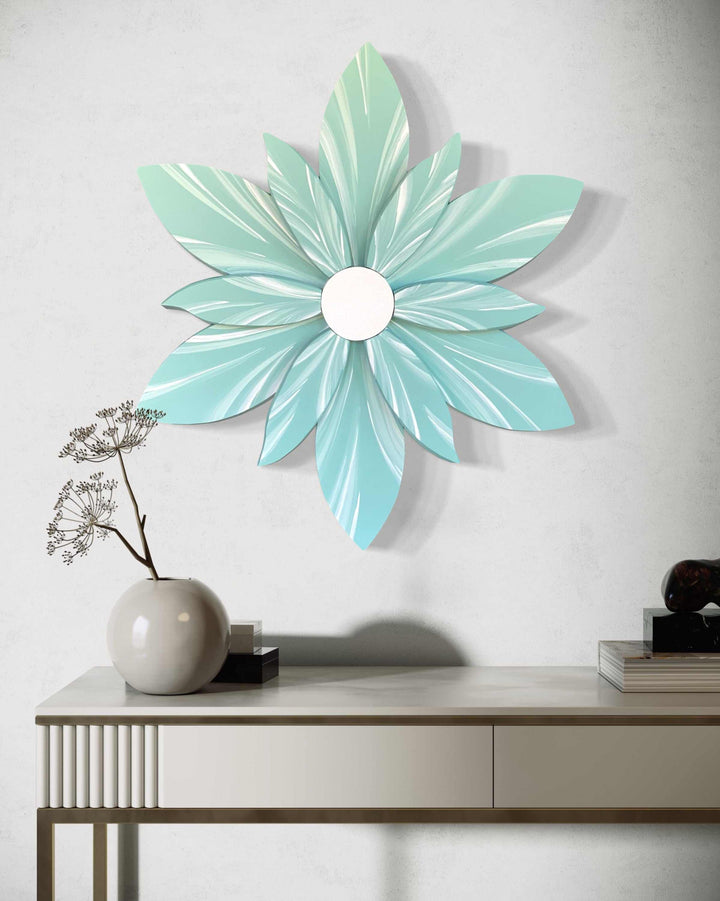 Handcrafted curled top petal flower decor in light blue hanging above a modern console table.