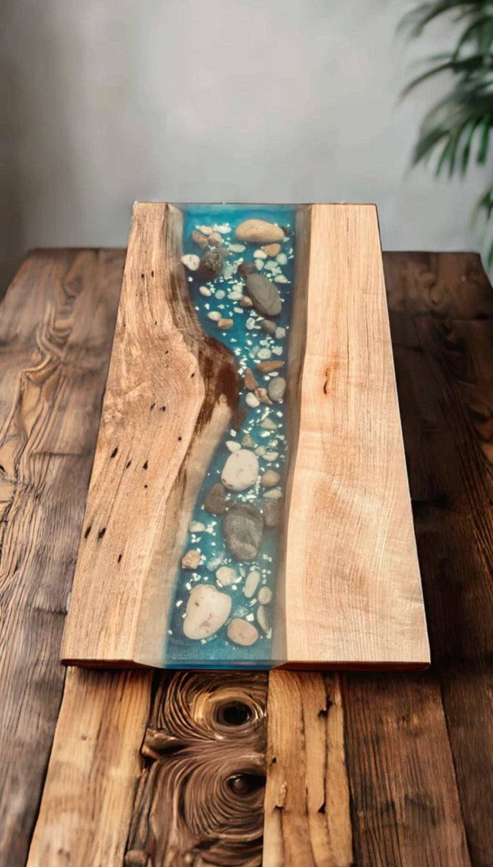 Maple epoxy resin serving tray with vibrant colors and stones, handcrafted in Canada.