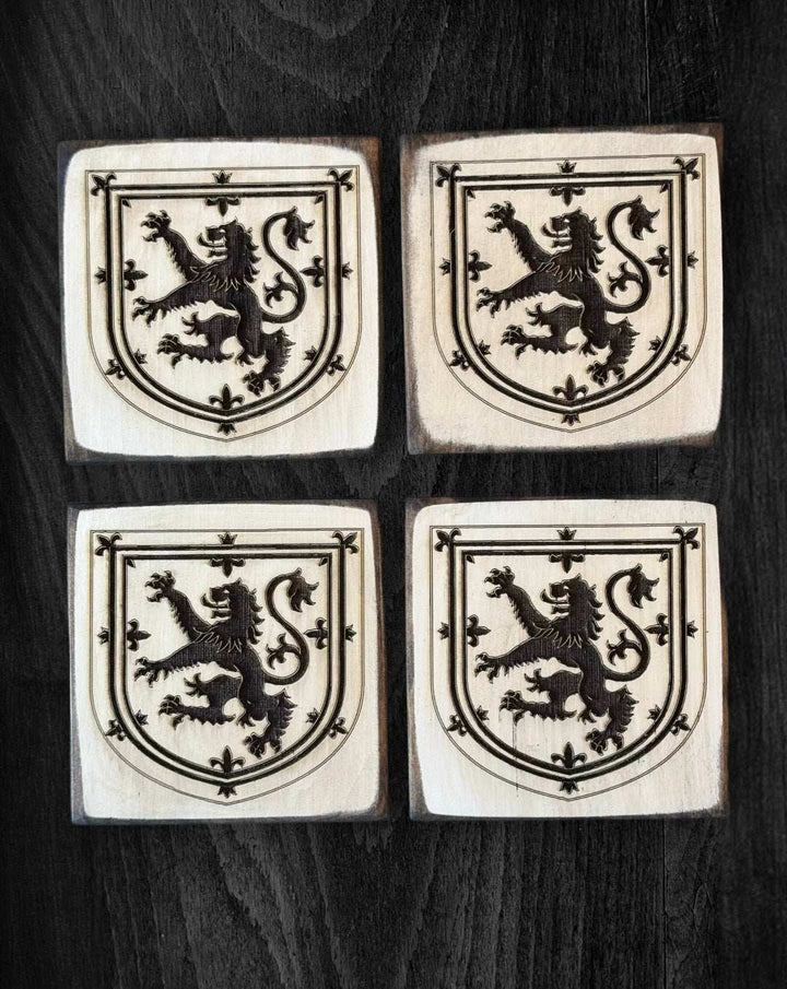 Handcrafted Nova Scotia wood coasters with engraved coat of arms design, set of four.