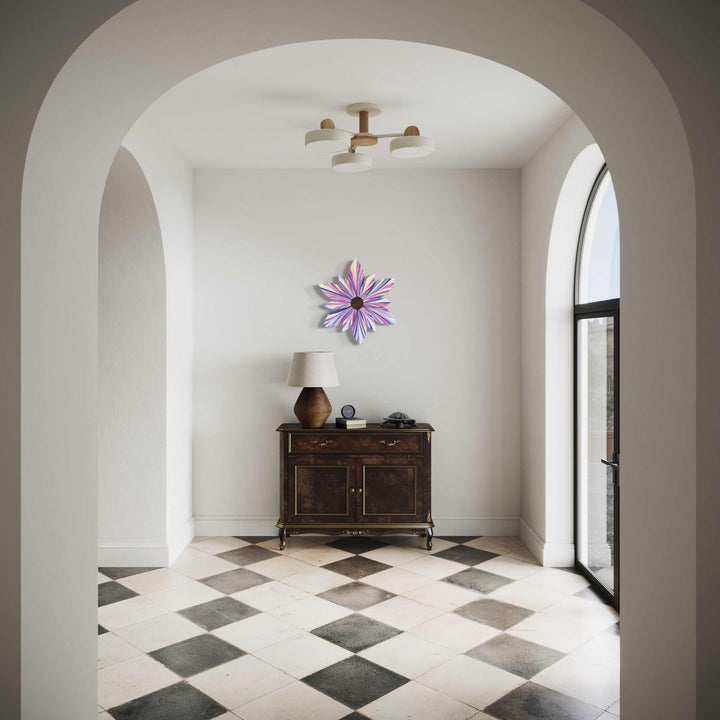 Front door wood flower decor with cotton candy design in a hallway setting.