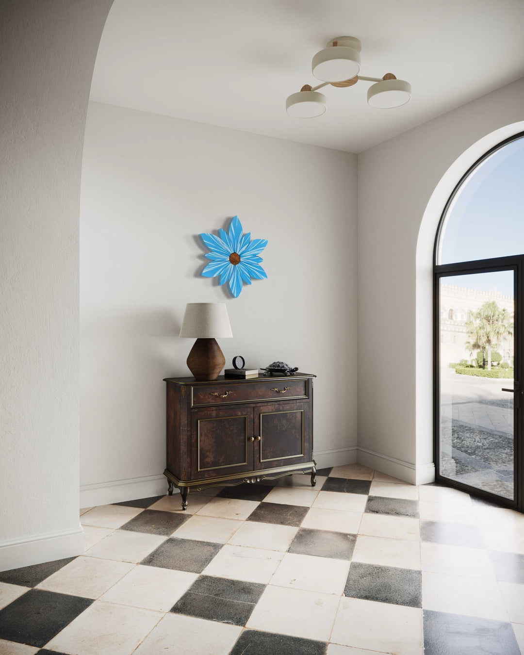 Handcrafted Bahama Sea Ocean Spray Wood Flower Decor on a white wall in a bright entryway.