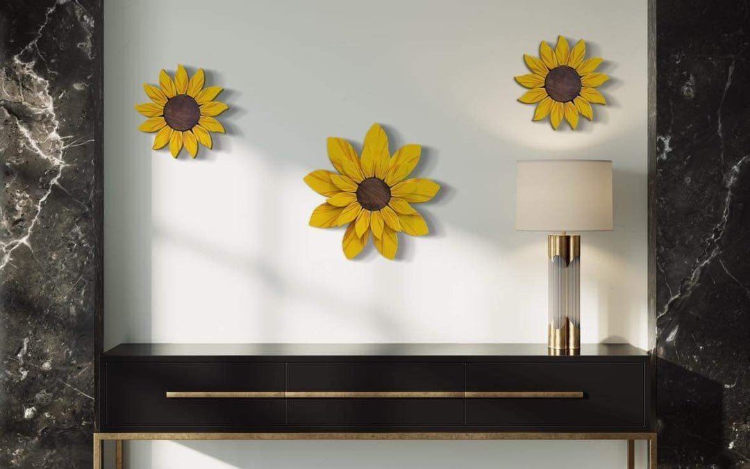 Handcrafted wooden sunflower door decoration displayed on a wall above a console table.