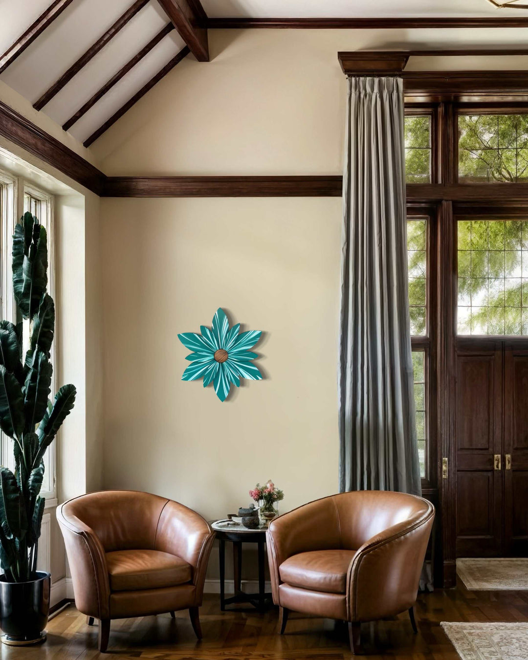 Juniper Green Wooden Flower door decoration in a living room setting with leather chairs and large windows.