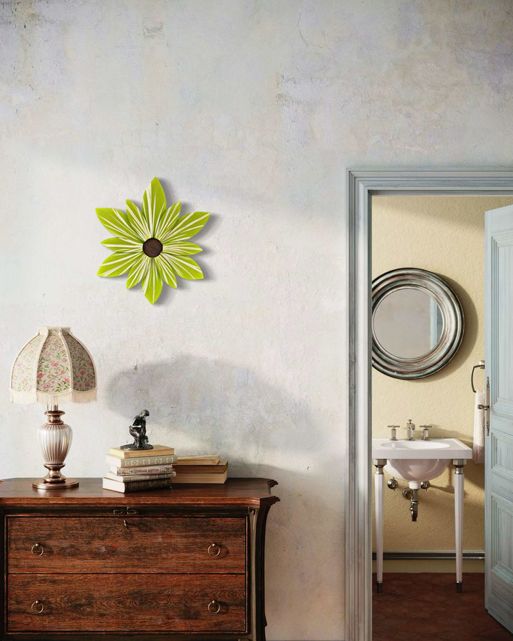 Handcrafted lime wood flower art on wall, painted with Benjamin Moore Aura paints, indoor decor.