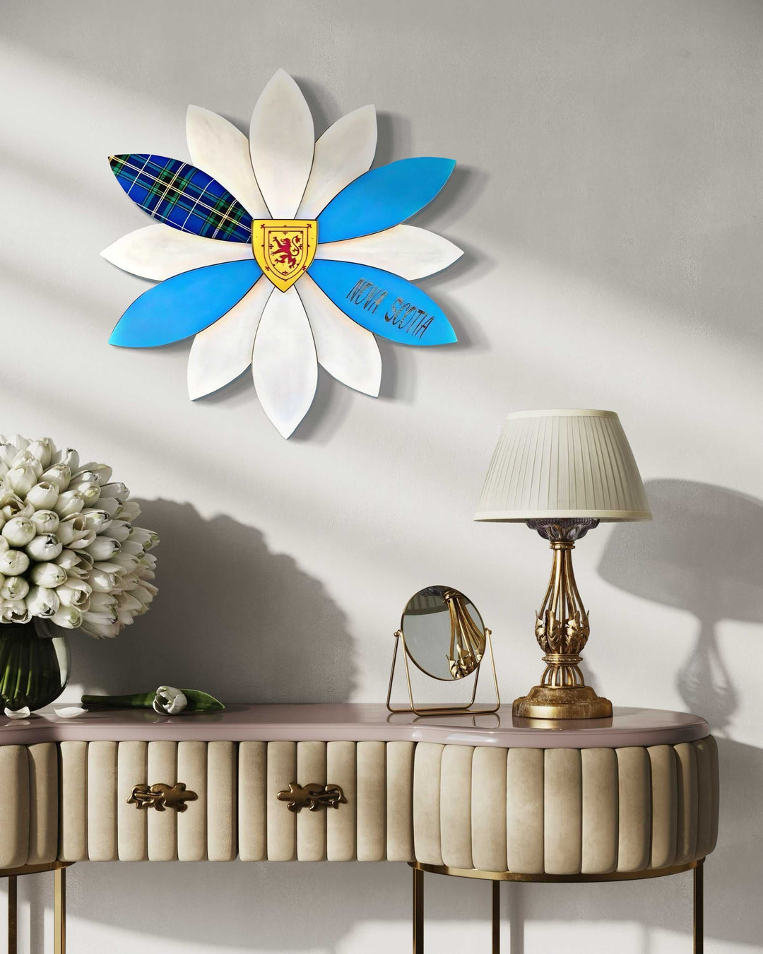 Handcrafted Nova Scotia wooden flower art piece on wall above table.