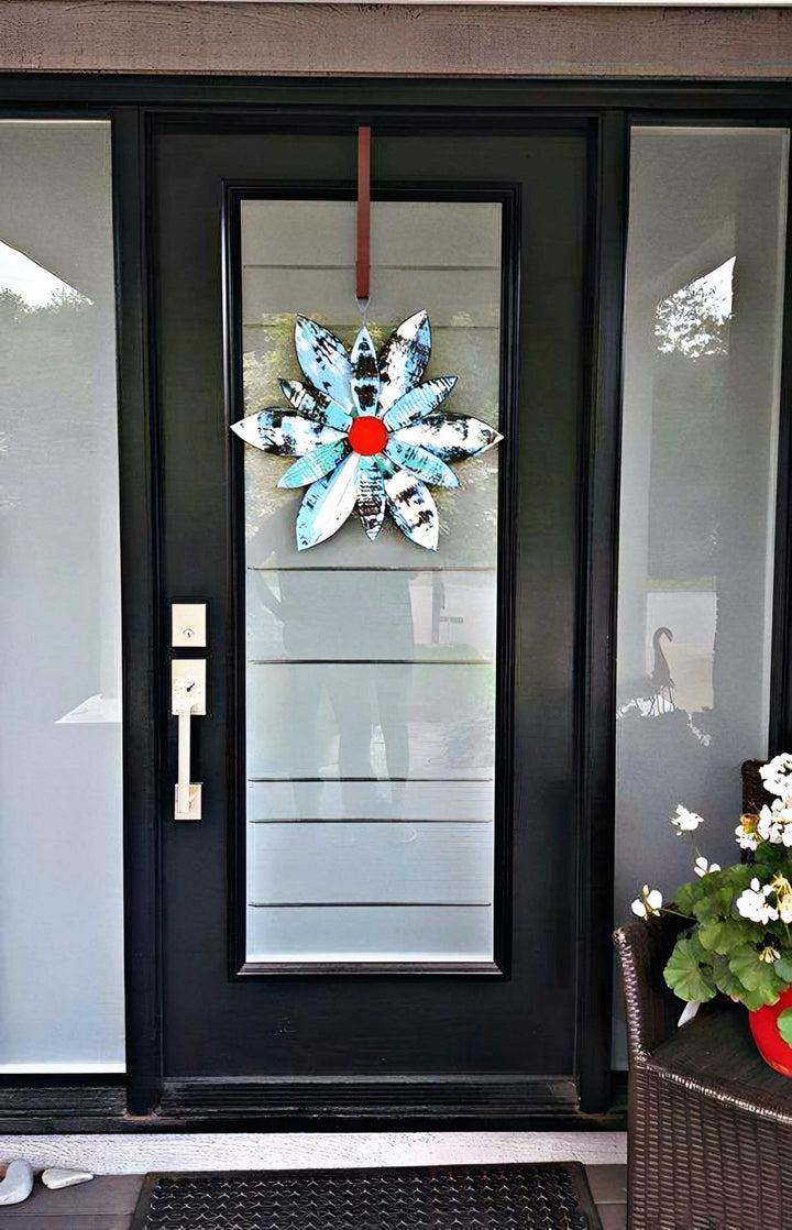 Nautical-themed wooden flower art decor hanging on a front door.