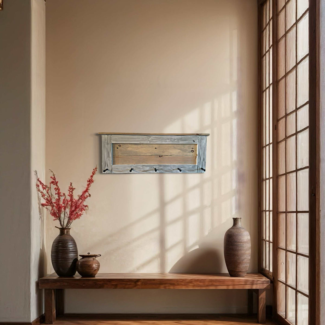 Modern rustic coat rack with wooden pegs, handmade from solid pine wood, finished in dark royal blue with a weathered oak stain.