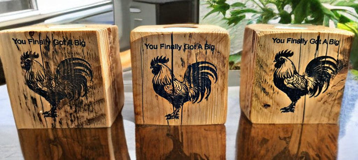 Quirky wooden tea light holders with humorous rooster design and bold text, perfect for personalized home decor.