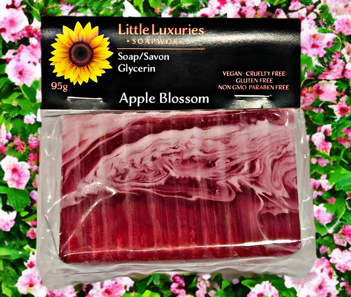 Apple Blossom glycerin soap bar, 95g, vegan and paraben-free, artisanal and moisturizing, against floral background.