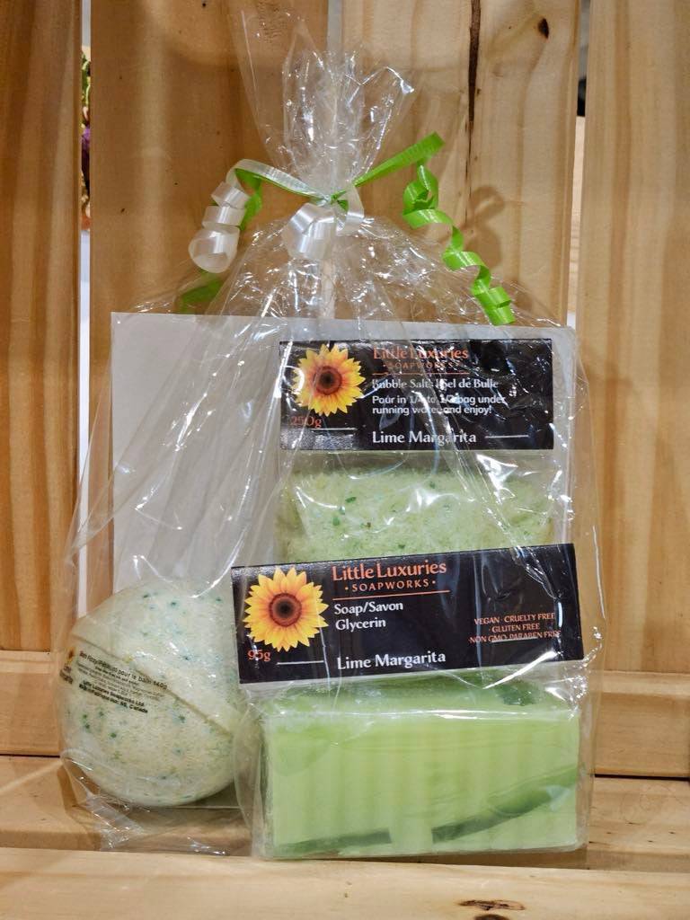 Gift pack with soap, bath bomb, and bubble salts in elegant packaging. Perfect self-care set for any occasion.