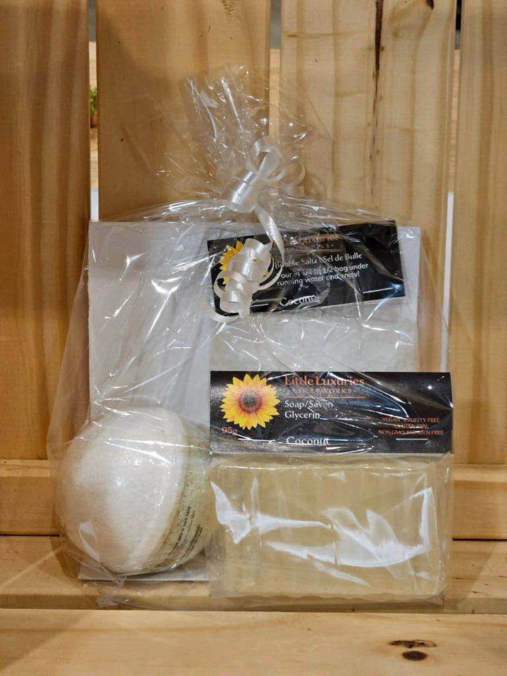 Gift pack with full-size soap bar, bath bomb, and bubble salts wrapped in elegant packaging.