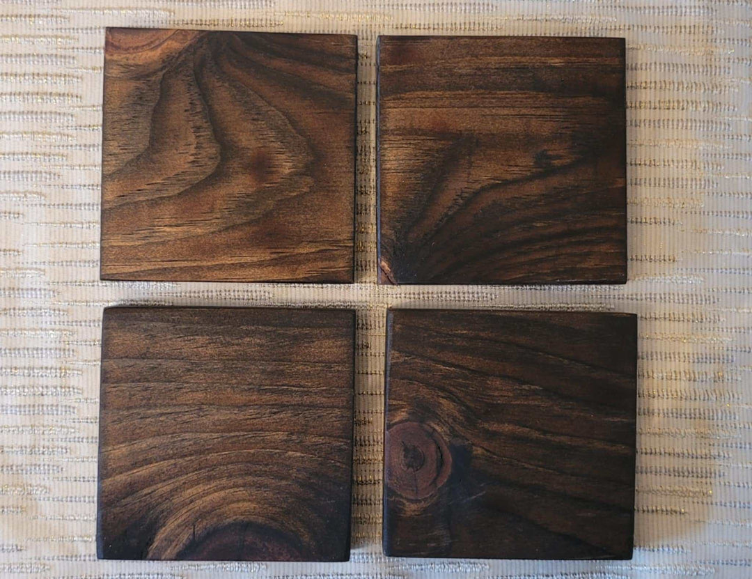 Set of 4 handcrafted rustic wood coasters made from sustainable pine wood, finished with Tung oil, perfect for farmhouse or rustic decor.