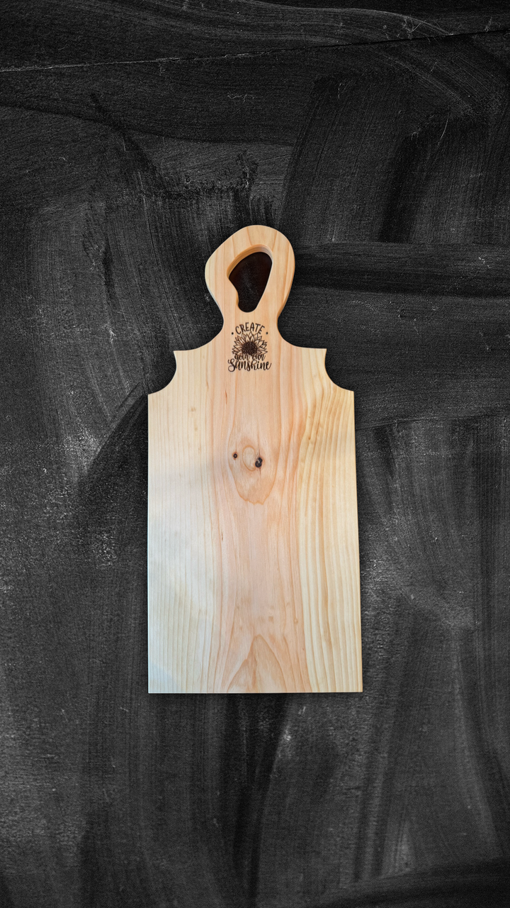 Handcrafted pine charcuterie board with laser engraving, 25" x 11", for entertaining.