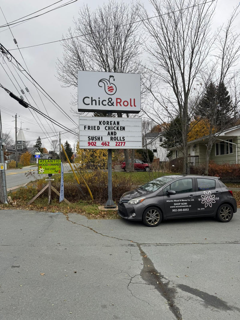 Handcrafted wooden flowers in our window
