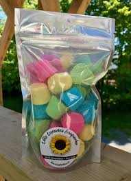 Colorful foaming bath bombs in a resealable pouch for fun and relaxing baths
