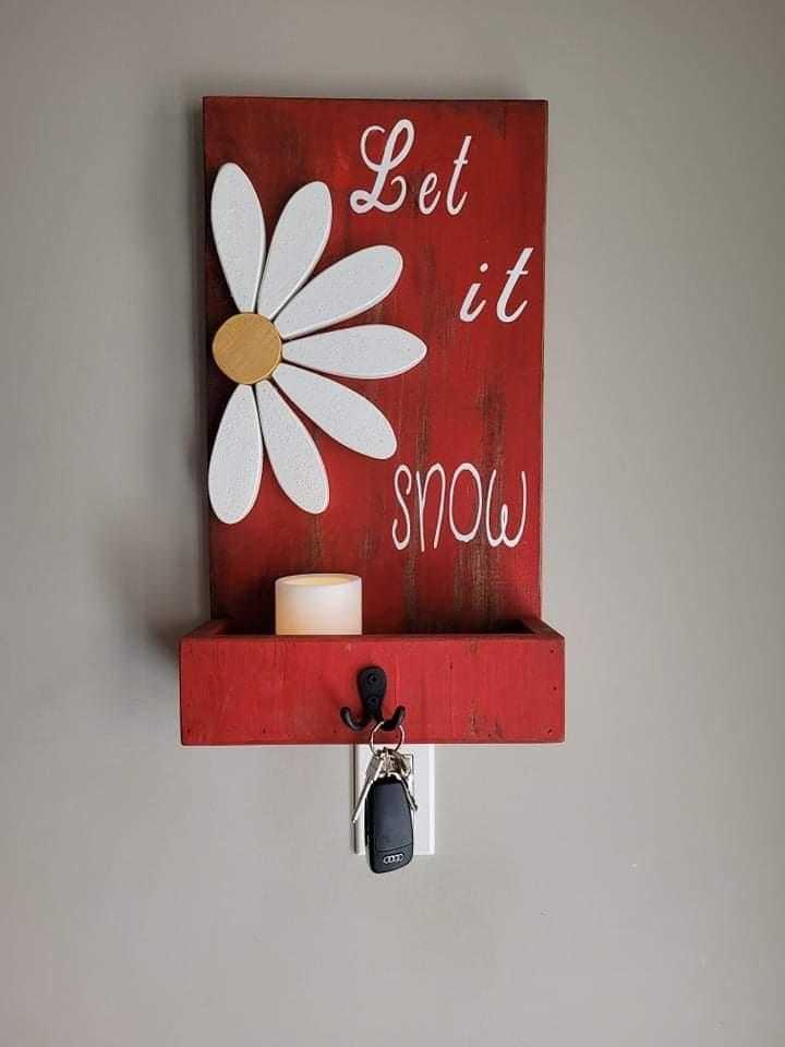 Stylish entryway key chain holder with flower design, handcrafted from pine wood, features double hook and decorative painting.