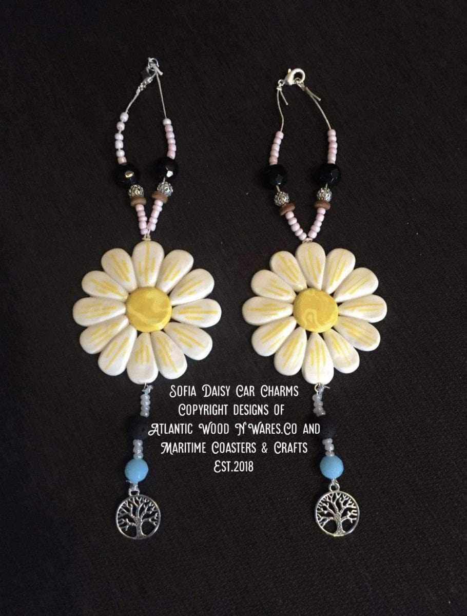 Support IWK Foundation with Sofia Daisy Car/Window Charms, handmade with polymer clay petals and including black lava and glass beads.