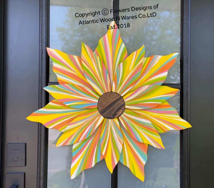Handcrafted Love Flower Door Decoration in vibrant spring colors with a gold center, 22x22 inches.