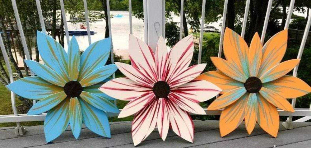 Handcrafted wooden flower trio with colorful painted petals, home decor.