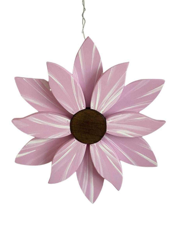 Pink wooden flower art piece with lifelike painted petals and stained wooden center, perfect for enhancing outdoor decor.
