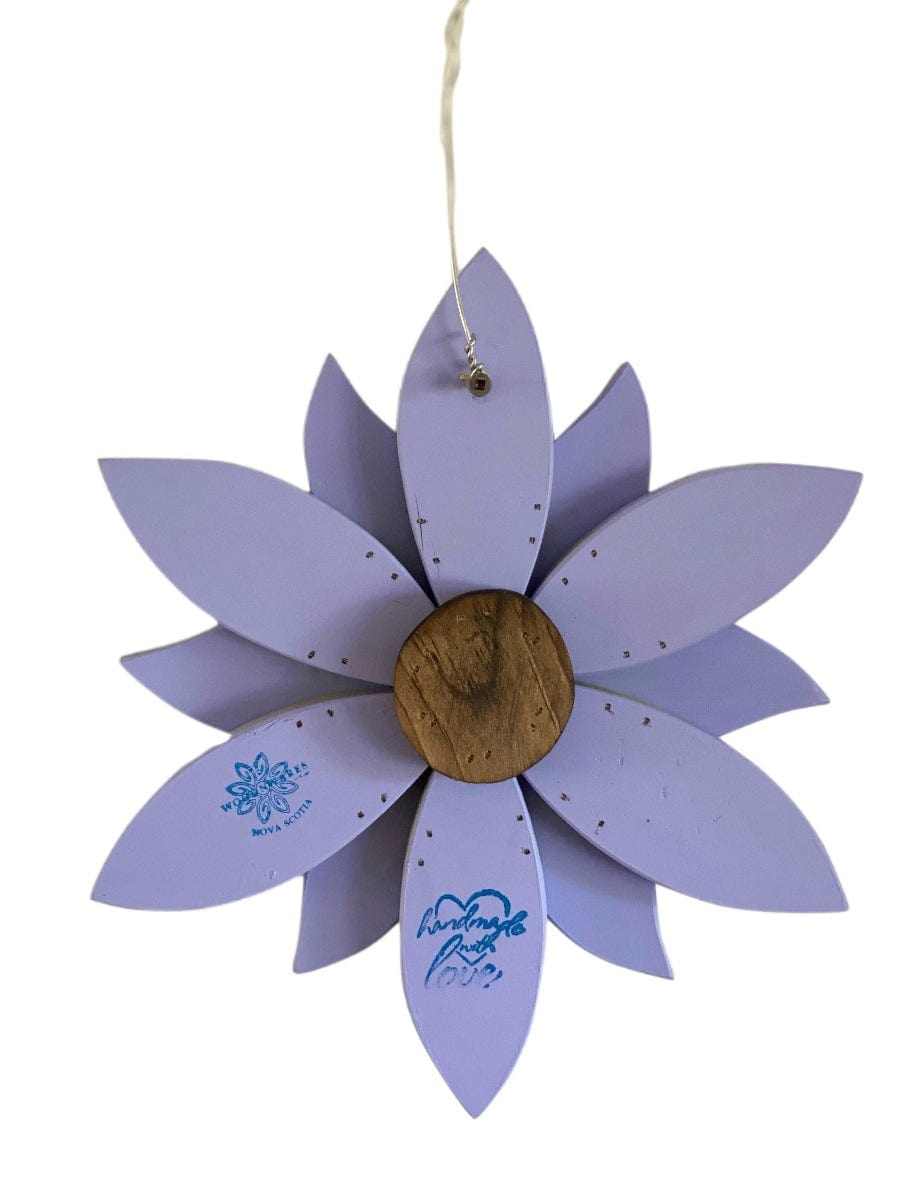 Elegant purple wooden flower art piece with a natural wood center, perfect for home decoration.