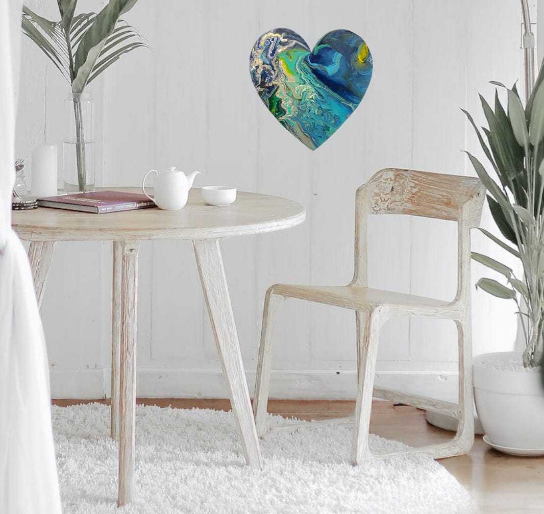 Handcrafted wooden heart wall art decor in a bright, modern room setting.