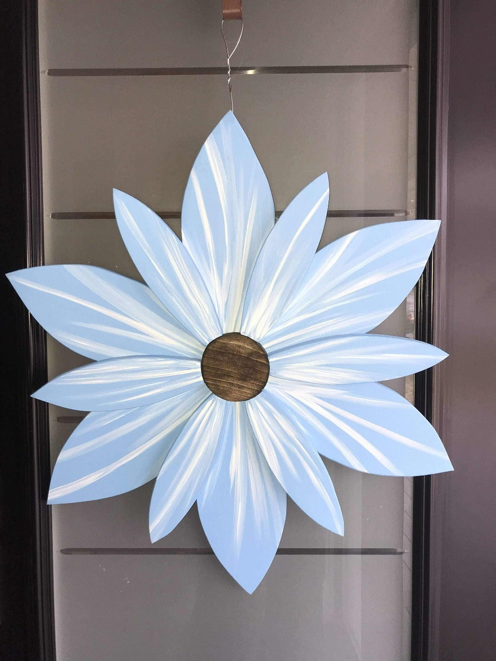 Costa Rica Blue Wood Flower Door Decoration with handcrafted petals and durable wire hanger.