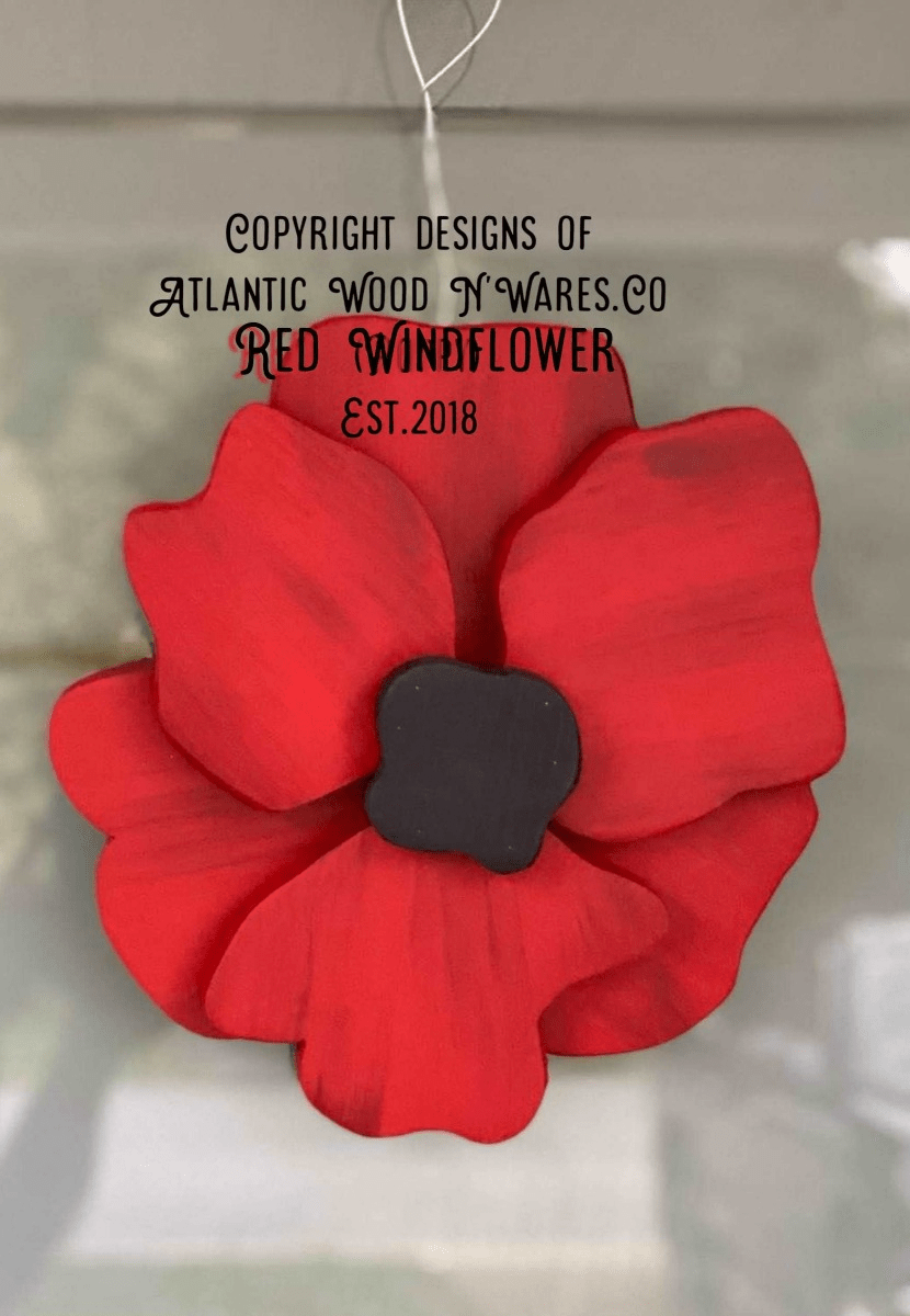 Red windflower door decoration made from pine wood, featuring an artisanal design with premium paint finish, symbolizing love and luck.