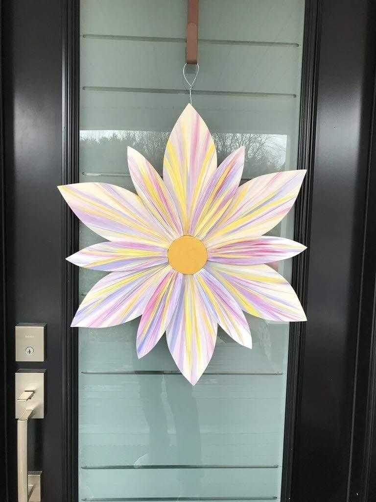 Lavender Lemonade Wooden Flower Art hanging on a door, handcrafted and painted with durable exterior paints.