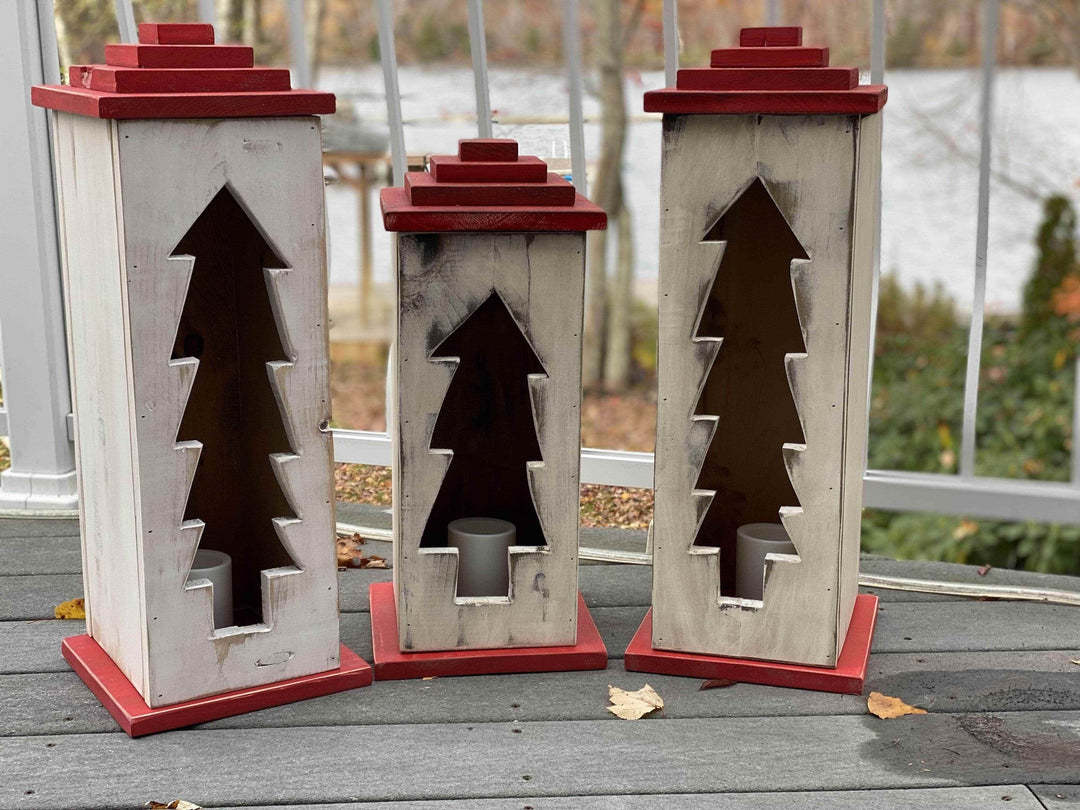 Handcrafted wooden lanterns with intricate designs, perfect for indoor and outdoor use.