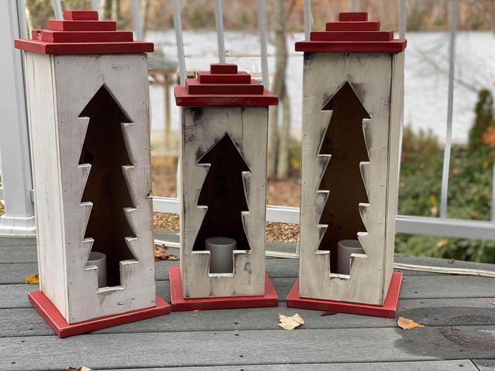 Handcrafted wooden lanterns with intricate designs, perfect for indoor and outdoor use.