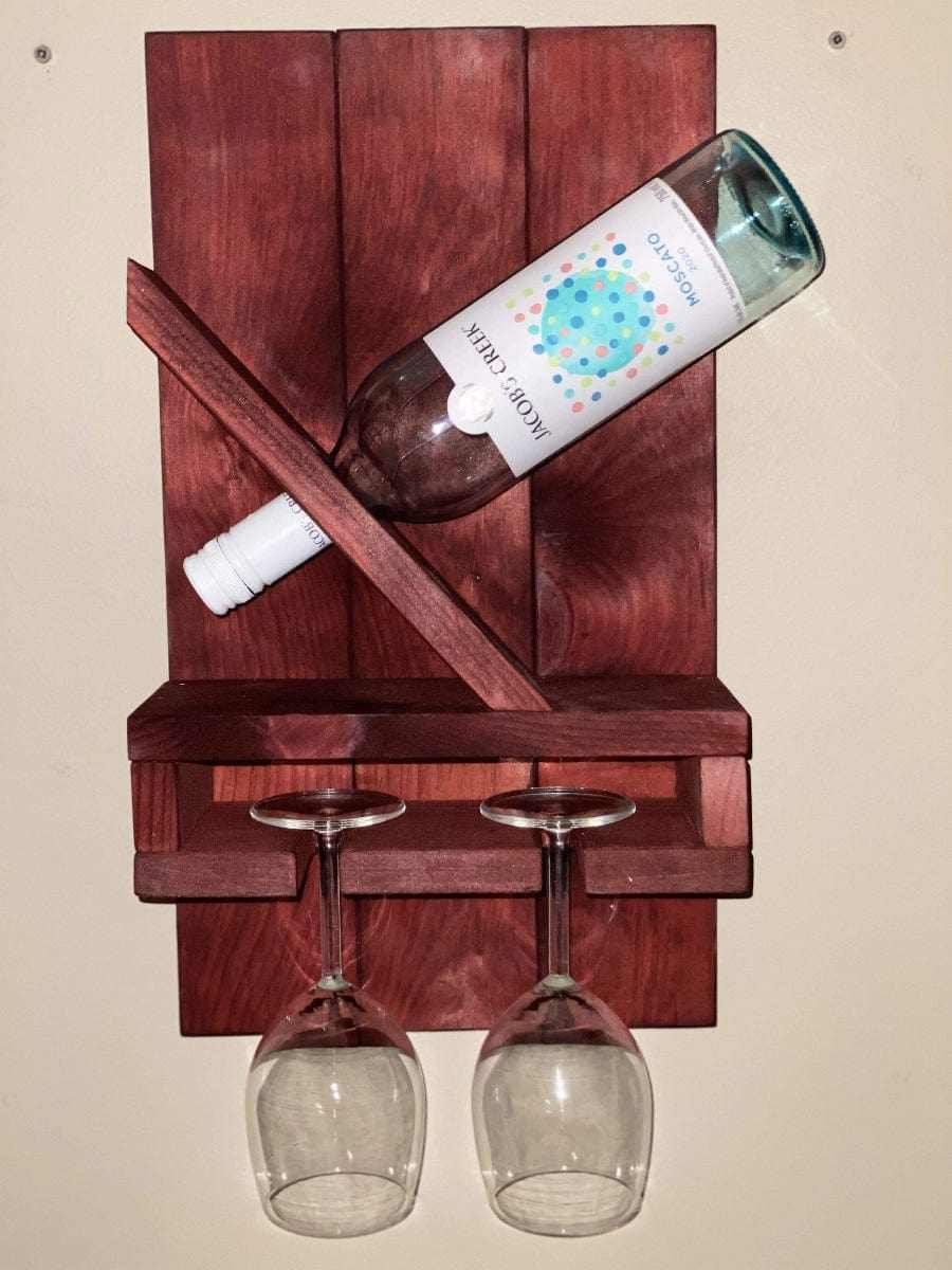 Rustic wooden glass and wine bottle holder, crafted from pine, 18 inches long, fits most sizes.