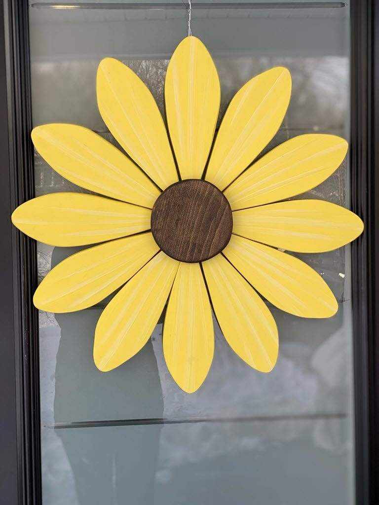 Handcrafted yellow wooden daisy flower art supporting the Sofia Daisy Campaign for children with congenital heart conditions in Canada