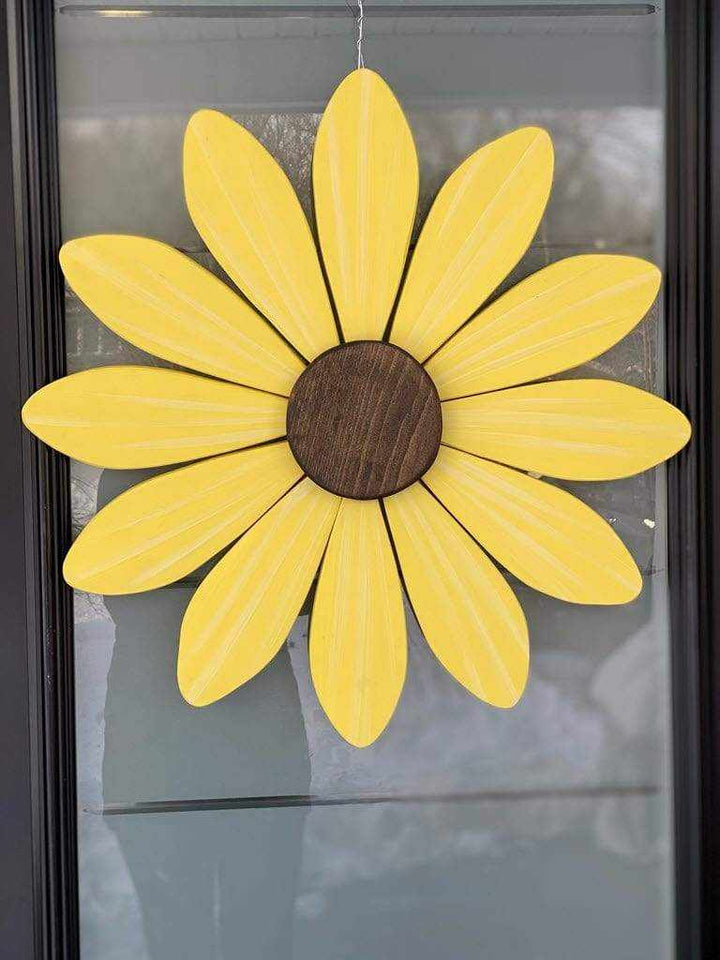 Handcrafted yellow wooden daisy flower art supporting the Sofia Daisy Campaign for children with congenital heart conditions in Canada