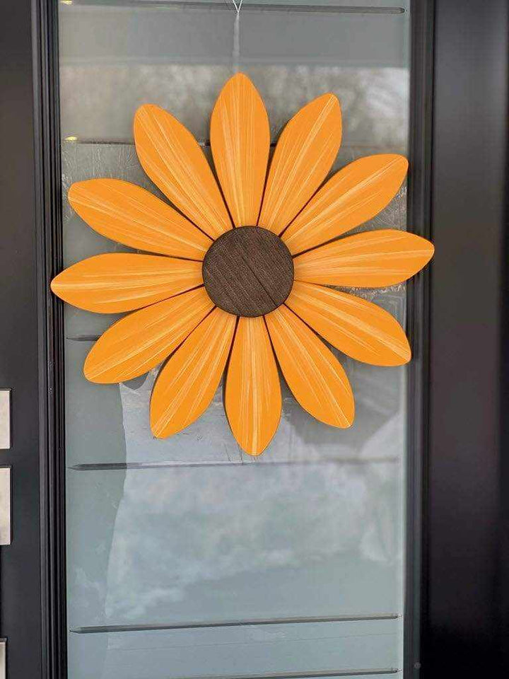 Handcrafted wooden sunflower art piece from the Sofia Daisy Campaign supporting children with congenital heart conditions in Canada