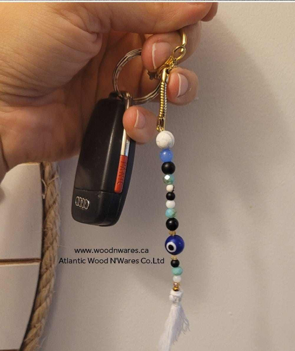 Evil Eye Keychain Holder with glass and howlite stones, macramé tassel, gold lock ring.