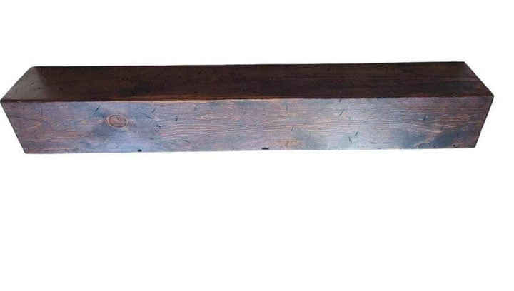 Rustic wood fireplace mantel in Dark Walnut finish showcasing Canadian craftsmanship.