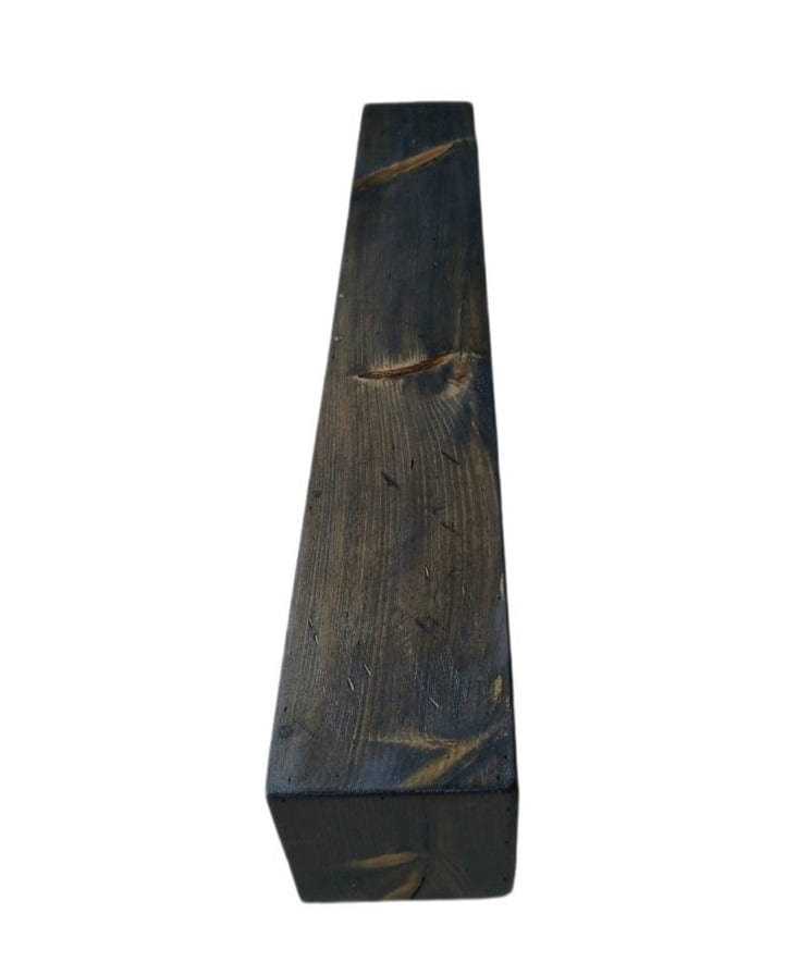 Handcrafted rustic wood fireplace mantel showcasing artisanal craftsmanship.