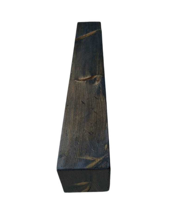 Handcrafted rustic wood fireplace mantel showcasing artisanal craftsmanship.