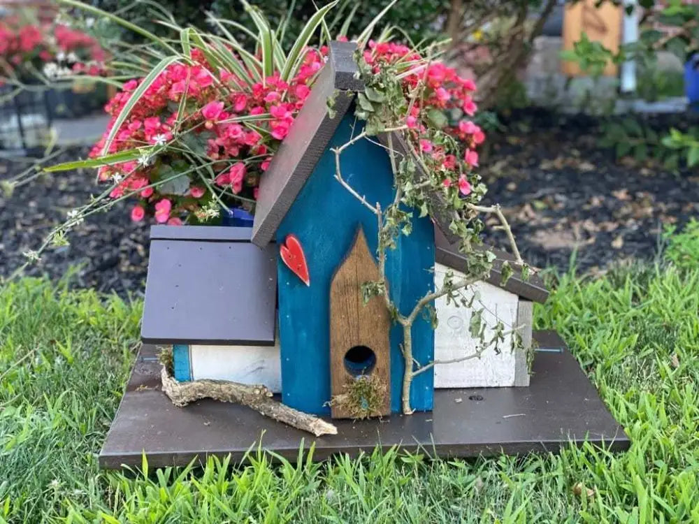 Triple birdhouse with colorful design, featuring custom sayings and decorations, ideal bird lover gift for gardens.