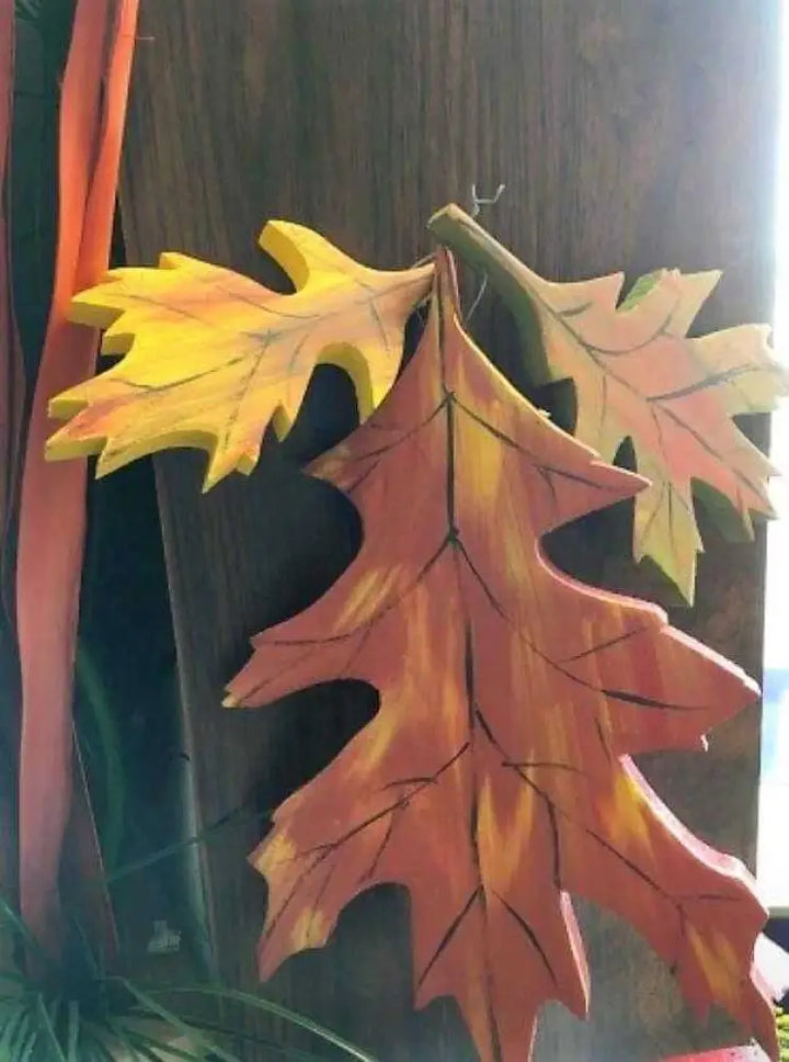 Handmade colorful oak leaf decor for fall, painted wood, 13x13 inches, made in Canada.
