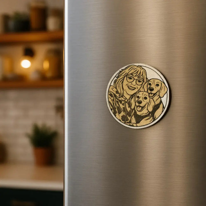 Circular wooden magnet with hand-drawn woman and two dogs in brown tones